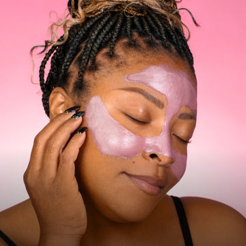 Model applying LYS Beauty skin product